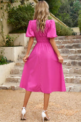 Robe mi-longue à manches bouffantes et taille froncée